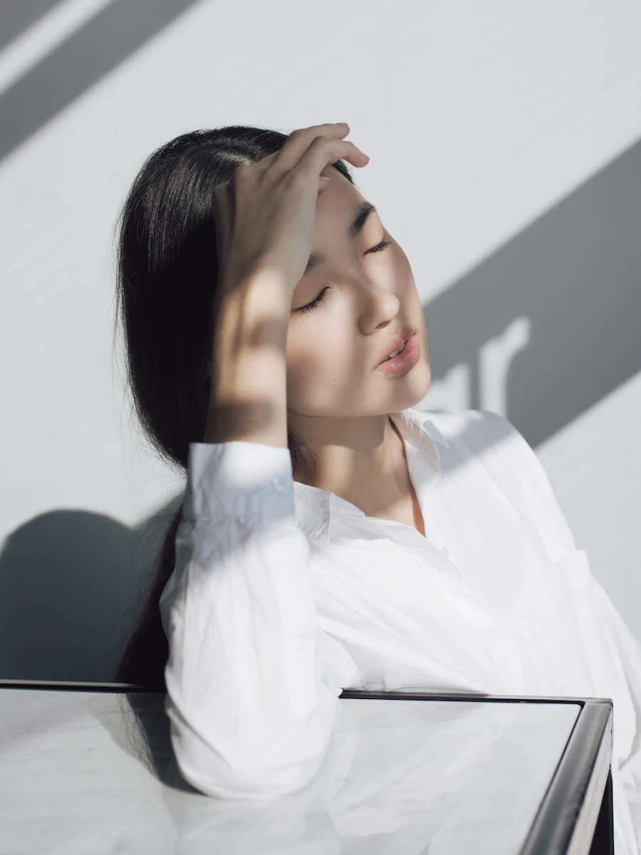 Woman with fresh, healthy-looking skin in soft Bangkok daylight