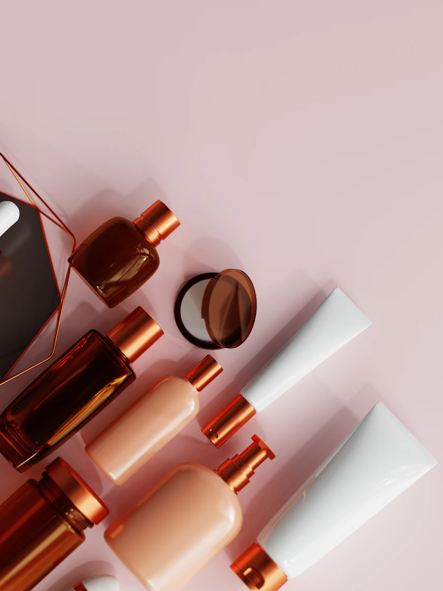 A curated collection of skincare bottles and compacts
